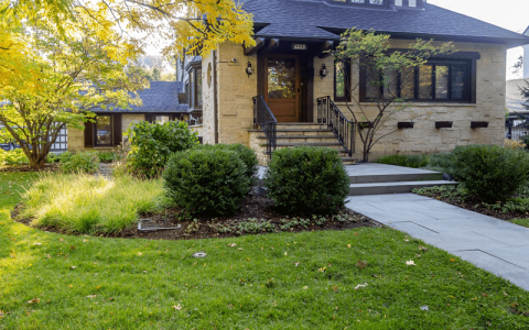Beautiful front yard with landscaped bushes