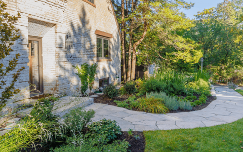 Garden walkway with bushes and landscaping